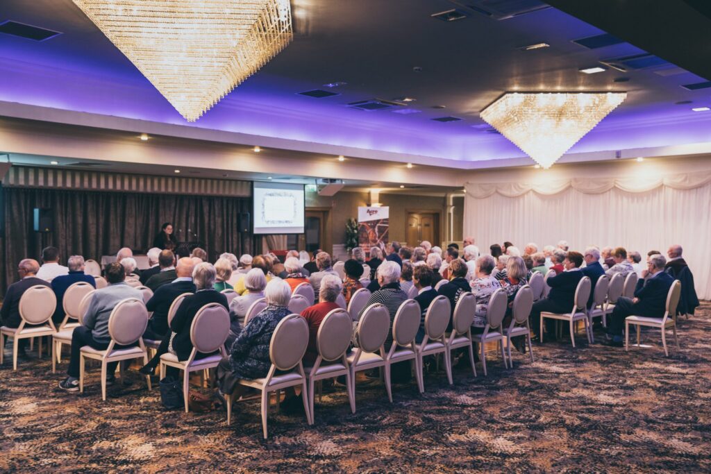 Supporters listening to a missionary at the Autumn Break